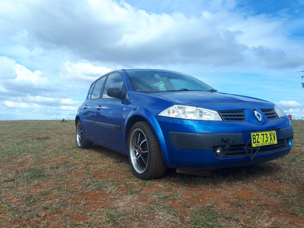 Ms Renault Megane from top of a hill